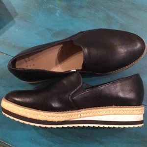 Black “a new day” shoes